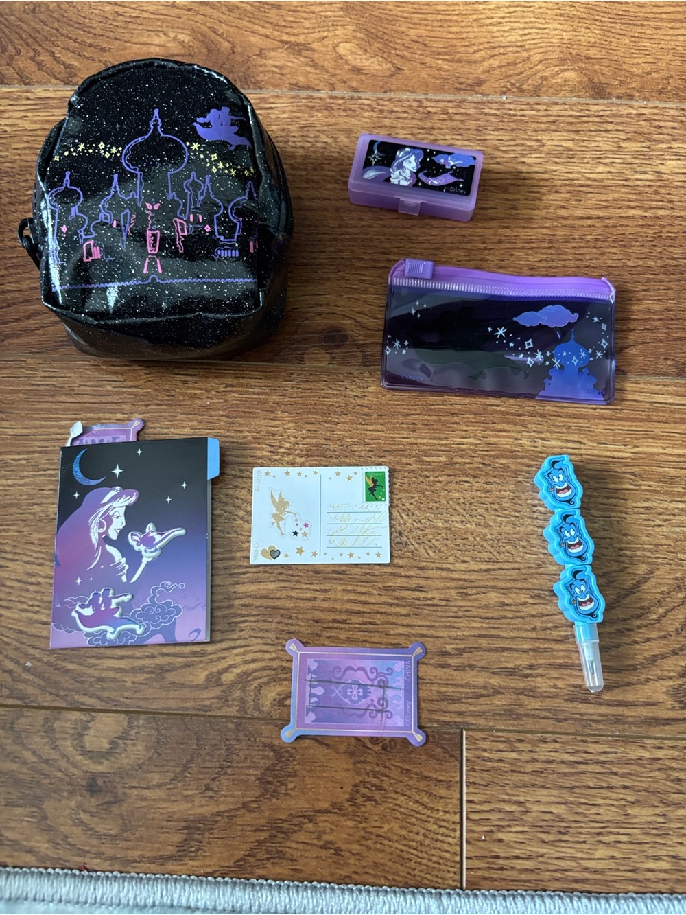 Aladdin Themed Phone Accessory Set - Assorted doll backpack & Decorative Pieces